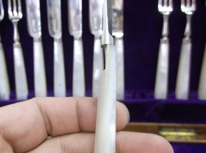 A CLASSY CANTEEN OF HALLMARKED SILVER FORKS AND KNIVES BY WALKER & HALL