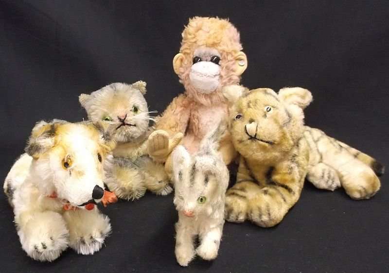 3 STEIFF LIKE CATS ....1 STEIFF LIKE DOG AND A GENUINE STEIFF MONKEY WITH A BUTTON IN HIS EAR !!