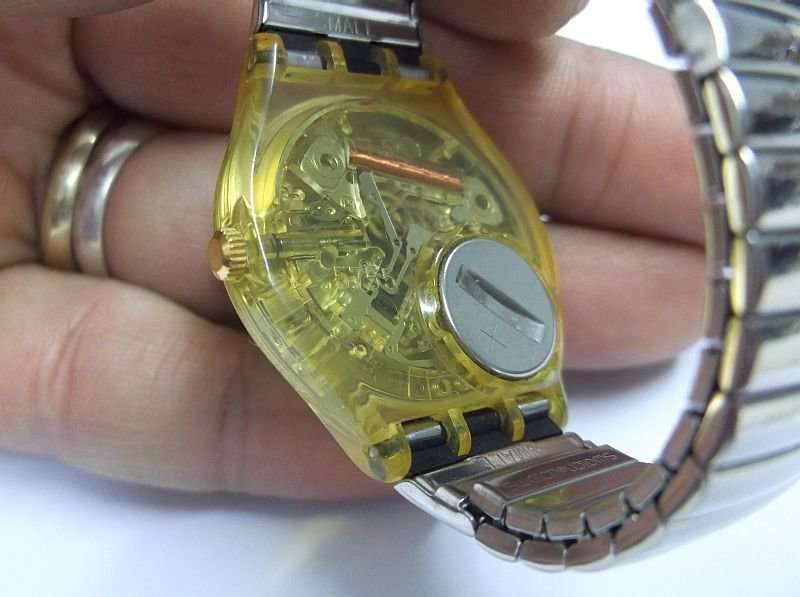 A TOTALLY AWESOME VINTAGE SWATCH WATCH IN ITS ORIGINAL CASE WITH MANUAL MADE IN 1991 ...$80 VALUE