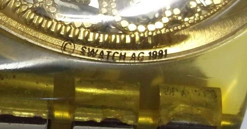 A TOTALLY AWESOME VINTAGE SWATCH WATCH IN ITS ORIGINAL CASE WITH MANUAL MADE IN 1991 ...$80 VALUE