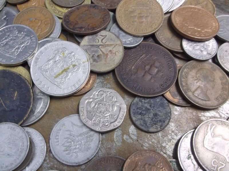 150 COINS FROM AROUND THE WORLD ....MAJORITY SOUTH AFRICAN....BID PER COIN TO TAKE ALL