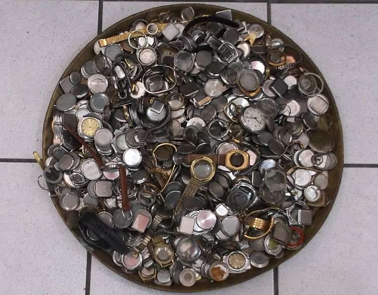 FOR THE WATCH ENTHUSIAST ...LITERALLY 1000`SSS OF WATCH PARTS N STRAPS...YOU ARE BIDDING FOR THE LOT
