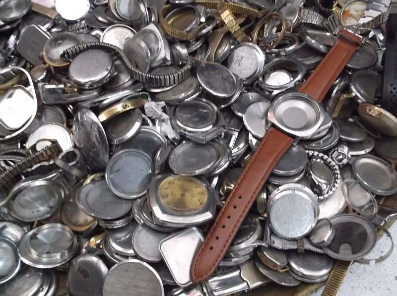 FOR THE WATCH ENTHUSIAST ...LITERALLY 1000`SSS OF WATCH PARTS N STRAPS...YOU ARE BIDDING FOR THE LOT