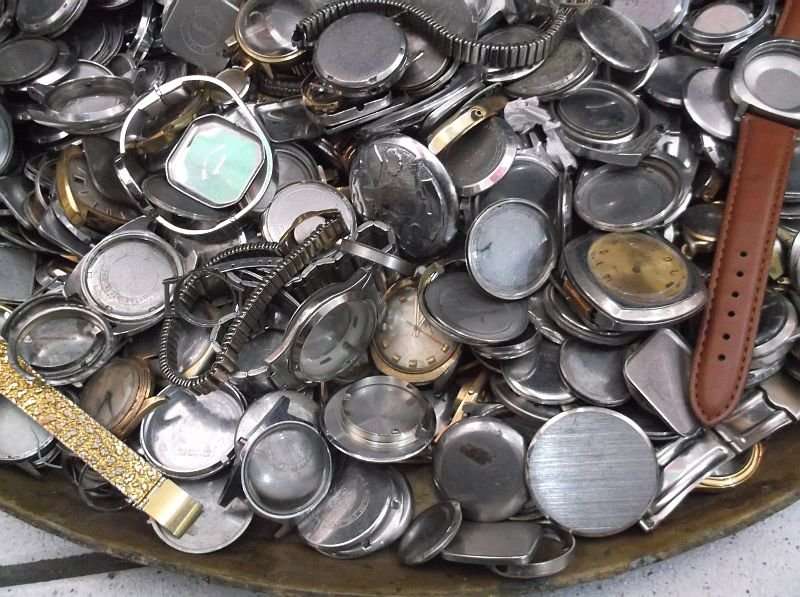 FOR THE WATCH ENTHUSIAST ...LITERALLY 1000`SSS OF WATCH PARTS N STRAPS...YOU ARE BIDDING FOR THE LOT