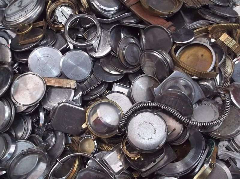 FOR THE WATCH ENTHUSIAST ...LITERALLY 1000`SSS OF WATCH PARTS N STRAPS...YOU ARE BIDDING FOR THE LOT