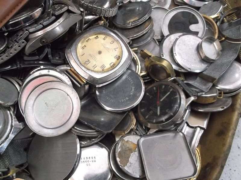 FOR THE WATCH ENTHUSIAST ...LITERALLY 1000`SSS OF WATCH PARTS N STRAPS...YOU ARE BIDDING FOR THE LOT