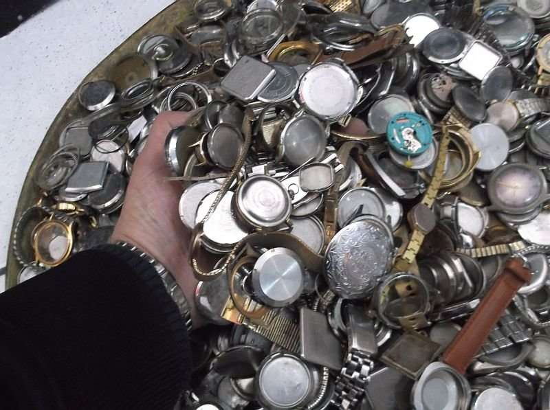 FOR THE WATCH ENTHUSIAST ...LITERALLY 1000`SSS OF WATCH PARTS N STRAPS...YOU ARE BIDDING FOR THE LOT