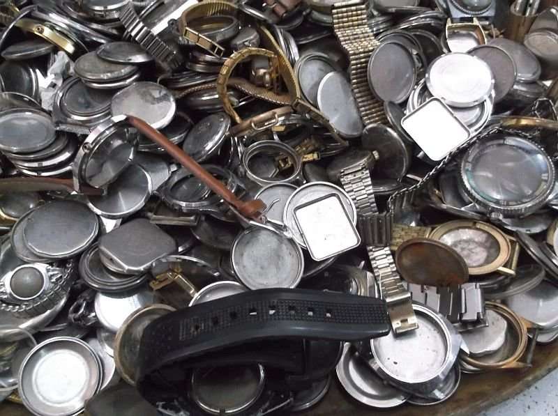 FOR THE WATCH ENTHUSIAST ...LITERALLY 1000`SSS OF WATCH PARTS N STRAPS...YOU ARE BIDDING FOR THE LOT