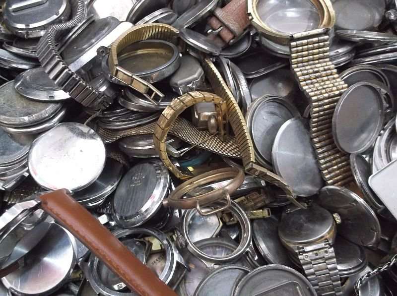 FOR THE WATCH ENTHUSIAST ...LITERALLY 1000`SSS OF WATCH PARTS N STRAPS...YOU ARE BIDDING FOR THE LOT