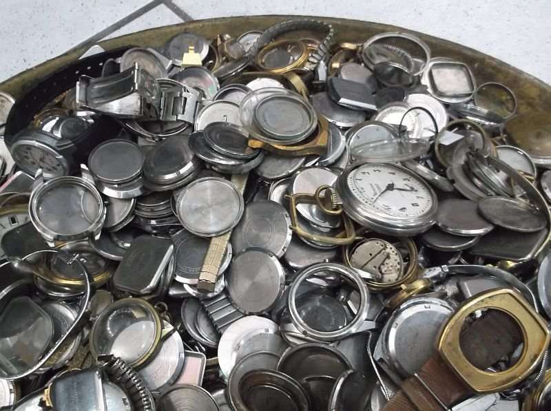 FOR THE WATCH ENTHUSIAST ...LITERALLY 1000`SSS OF WATCH PARTS N STRAPS...YOU ARE BIDDING FOR THE LOT