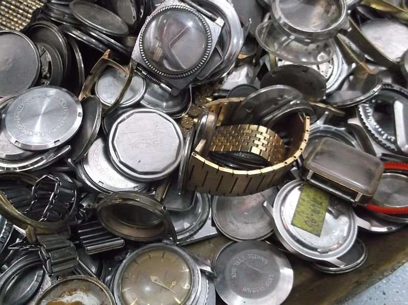 FOR THE WATCH ENTHUSIAST ...LITERALLY 1000`SSS OF WATCH PARTS N STRAPS...YOU ARE BIDDING FOR THE LOT