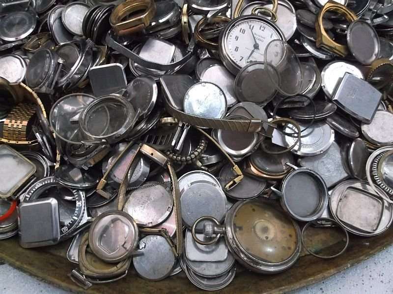 FOR THE WATCH ENTHUSIAST ...LITERALLY 1000`SSS OF WATCH PARTS N STRAPS...YOU ARE BIDDING FOR THE LOT