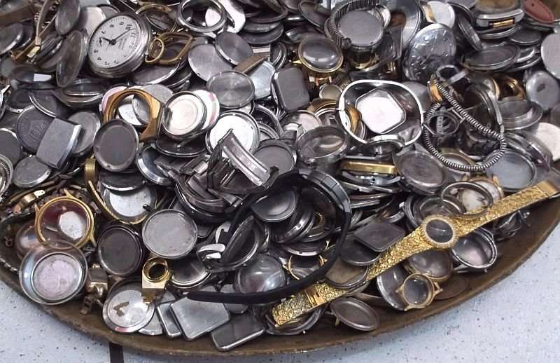 FOR THE WATCH ENTHUSIAST ...LITERALLY 1000`SSS OF WATCH PARTS N STRAPS...YOU ARE BIDDING FOR THE LOT
