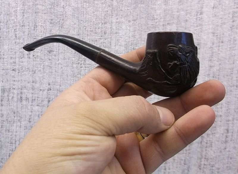 A COOL VINTAGE SMOKING PIPE BY GOLDENLEAF WITH CARVED LION MOTIF ....WICKED !!