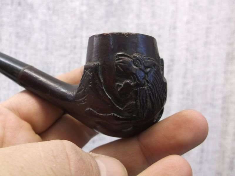 A COOL VINTAGE SMOKING PIPE BY GOLDENLEAF WITH CARVED LION MOTIF ....WICKED !!