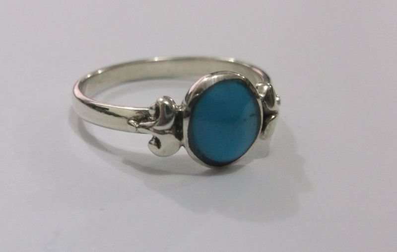 A FANTASTIC SOLID STERLING SILVER RING SET WITH A COOL TURQUOISE LOOK INLAY ...STUNNER !!