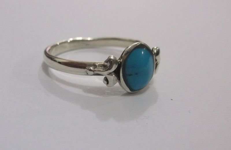 A FANTASTIC SOLID STERLING SILVER RING SET WITH A COOL TURQUOISE LOOK INLAY ...STUNNER !!