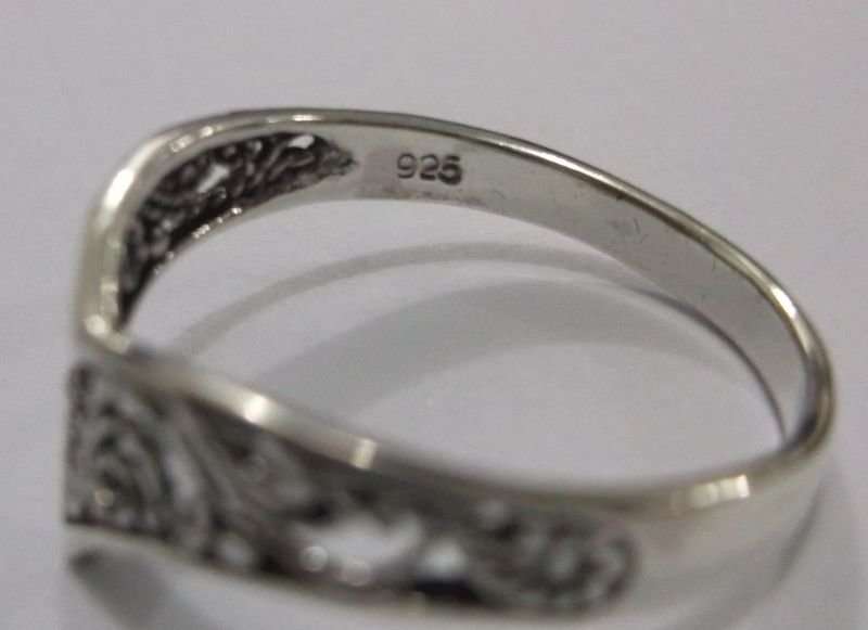 A LOVELY SOLID STERLING SILVER RING WITH FILIGREE DETAIL AND POINTED TIP ...SOMETHING DIFFERENT