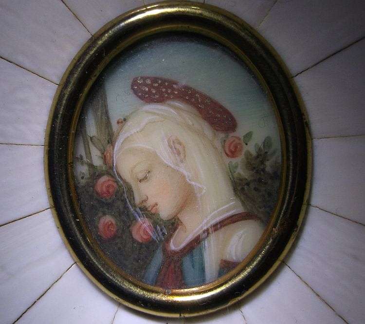 AN EXQUISITE OLD HAND PAINTED PICTURE OF A MAIDEN IN A PRE BAN IVORY OR BONE FRAME