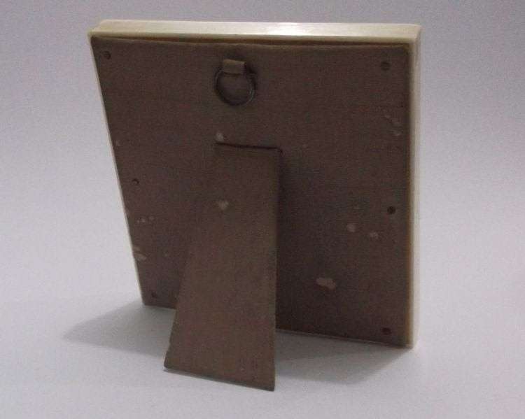 AN EXQUISITE OLD HAND PAINTED PICTURE OF A MAIDEN IN A PRE BAN IVORY OR BONE FRAME