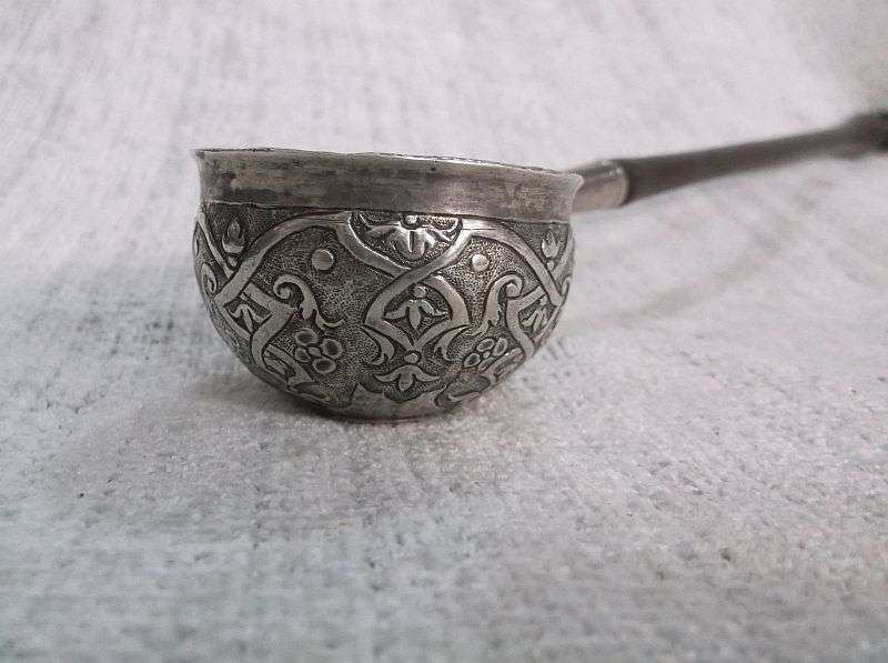 AN INTRIGUING NORWEGIAN SILVER BOWL LADLE SET WITH A 308 YEAR OLD COIN REIGN OF KING FREDERICK IV