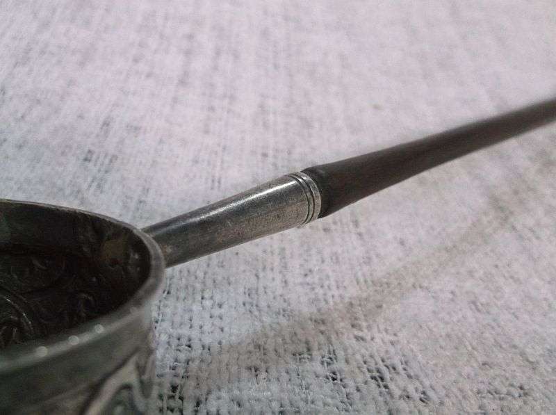 AN INTRIGUING NORWEGIAN SILVER BOWL LADLE SET WITH A 308 YEAR OLD COIN REIGN OF KING FREDERICK IV