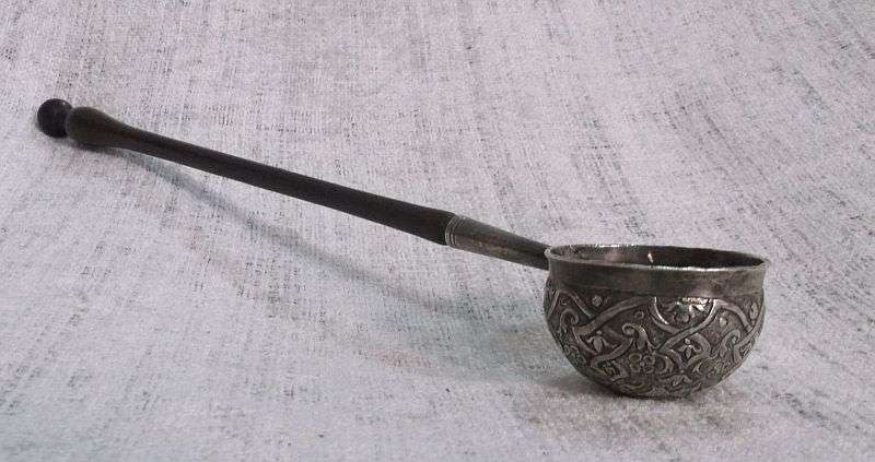 AN INTRIGUING NORWEGIAN SILVER BOWL LADLE SET WITH A 308 YEAR OLD COIN REIGN OF KING FREDERICK IV