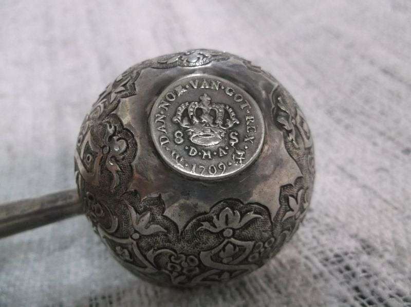 AN INTRIGUING NORWEGIAN SILVER BOWL LADLE SET WITH A 308 YEAR OLD COIN REIGN OF KING FREDERICK IV