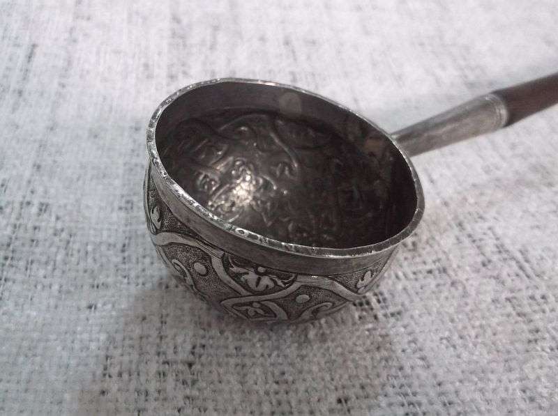 AN INTRIGUING NORWEGIAN SILVER BOWL LADLE SET WITH A 308 YEAR OLD COIN REIGN OF KING FREDERICK IV