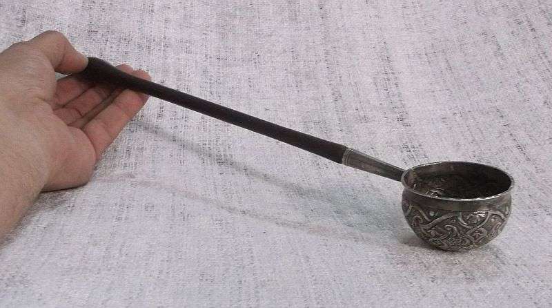 AN INTRIGUING NORWEGIAN SILVER BOWL LADLE SET WITH A 308 YEAR OLD COIN REIGN OF KING FREDERICK IV