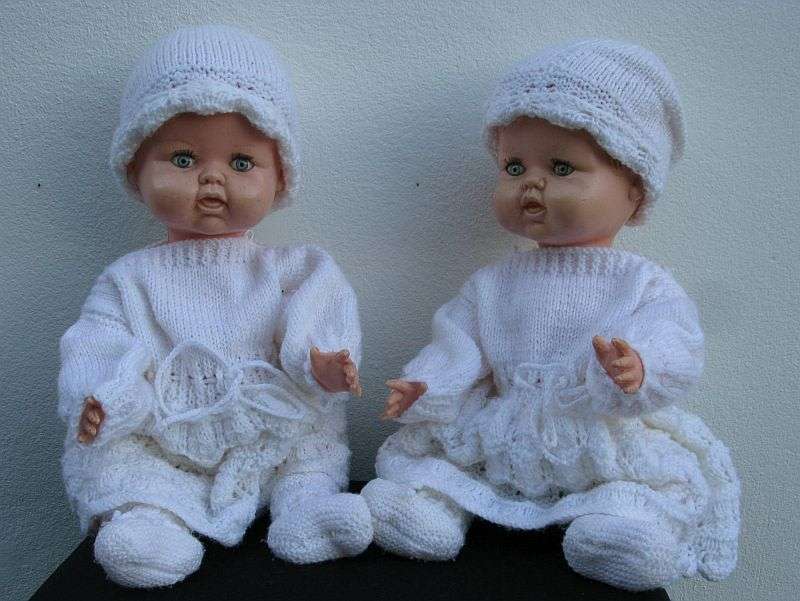 TOO CUTE !! A PAIR OF VINTAGE HARD PLASTIC BABY DOLLS WITH HAND MADE CLOTHING ...BID FOR BOTH ...WOW
