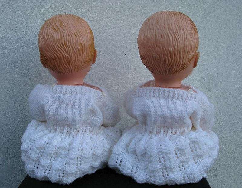 TOO CUTE !! A PAIR OF VINTAGE HARD PLASTIC BABY DOLLS WITH HAND MADE CLOTHING ...BID FOR BOTH ...WOW