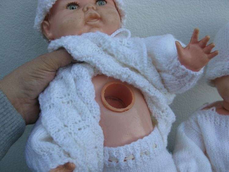 TOO CUTE !! A PAIR OF VINTAGE HARD PLASTIC BABY DOLLS WITH HAND MADE CLOTHING ...BID FOR BOTH ...WOW