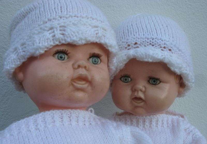 TOO CUTE !! A PAIR OF VINTAGE HARD PLASTIC BABY DOLLS WITH HAND MADE CLOTHING ...BID FOR BOTH ...WOW