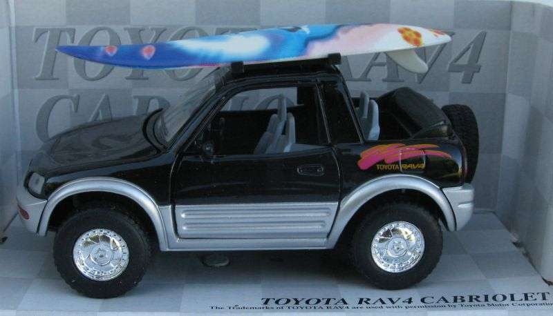 SWEET DUDE !! A 1:32 SCALE DIE CAST METAL MODEL OF THE TOYOTA RAV4 CABRIOLET WITH SURFBOARD ...NICE