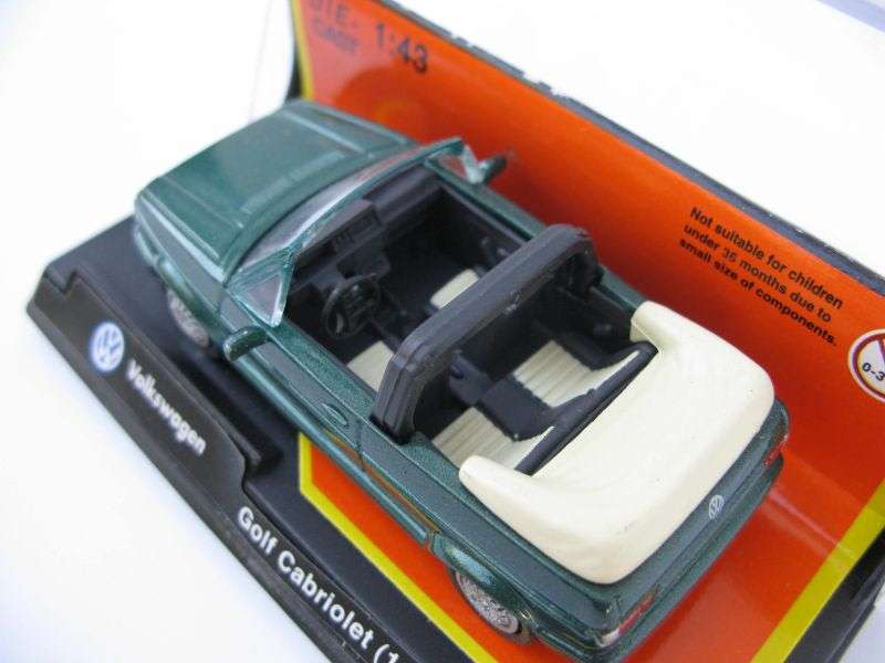 NICE FIND !! A 1:43 SCALE DIE CAST METAL MODEL OF THE 1988 VW GOLF CABRIOLET BY NEW RAY ...WOW !!!