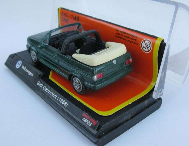 NICE FIND !! A 1:43 SCALE DIE CAST METAL MODEL OF THE 1988 VW GOLF CABRIOLET BY NEW RAY ...WOW !!!
