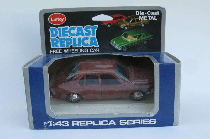 VINTAGE !! A 1:43 SCALE DIE CAST METAL CAR BY LINTOY BOXED AND SEALED ...POSSIBLY A BMW BY THE GRILL