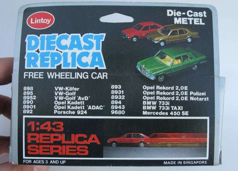 VINTAGE !! A 1:43 SCALE DIE CAST METAL CAR BY LINTOY BOXED AND SEALED ...POSSIBLY A BMW BY THE GRILL