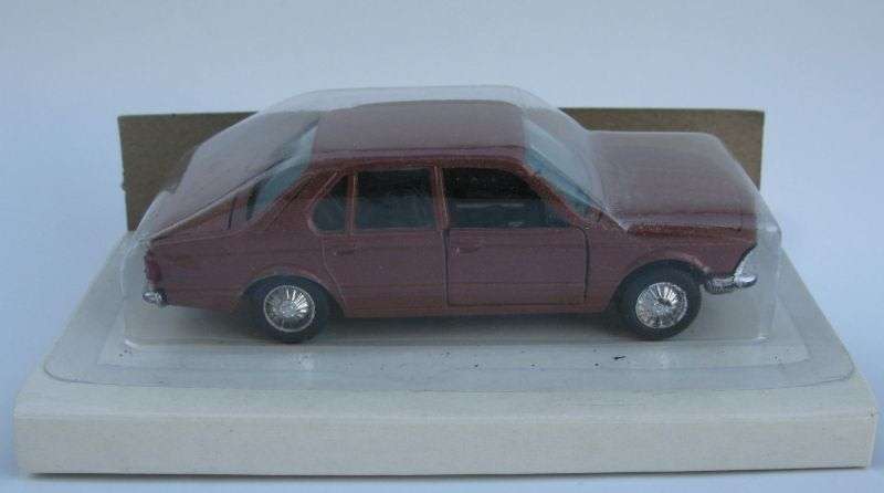VINTAGE !! A 1:43 SCALE DIE CAST METAL CAR BY LINTOY BOXED AND SEALED ...POSSIBLY A BMW BY THE GRILL