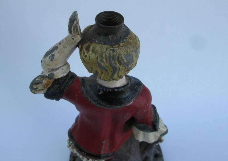 A CHARACTERFUL OLD BOY FIGURE LEAD OR OTHER HEAVY METAL HAND PAINTED LAMP BASE