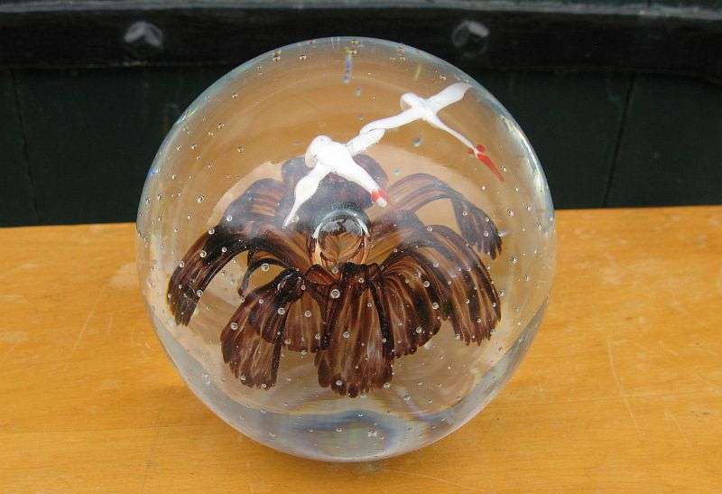 A M A Z I N G !!! A VINTAGE SOLID GLASS PAPERWEIGHT WITH FLOWER AND BIRD DETAIL ...INTERNAL BUBBLES