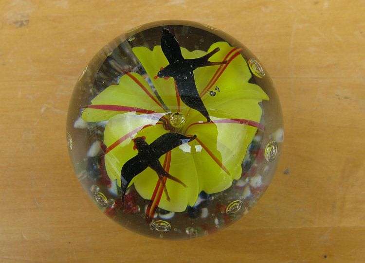 LOVELY !! A RARE VINTAGE SOLID GLASS PAPERWEIGHT WITH YELLOW FLOWER AND BLACK BIRD DETAIL...WOW !!!