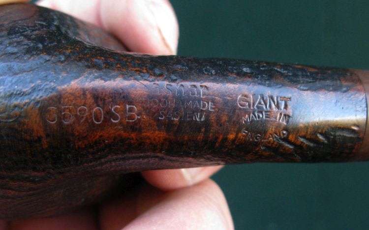 THREE VINTAGE SMOKING PIPES PLUS RACK