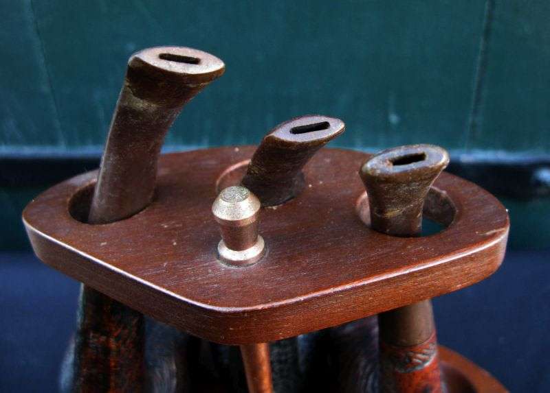 THREE VINTAGE SMOKING PIPES PLUS RACK