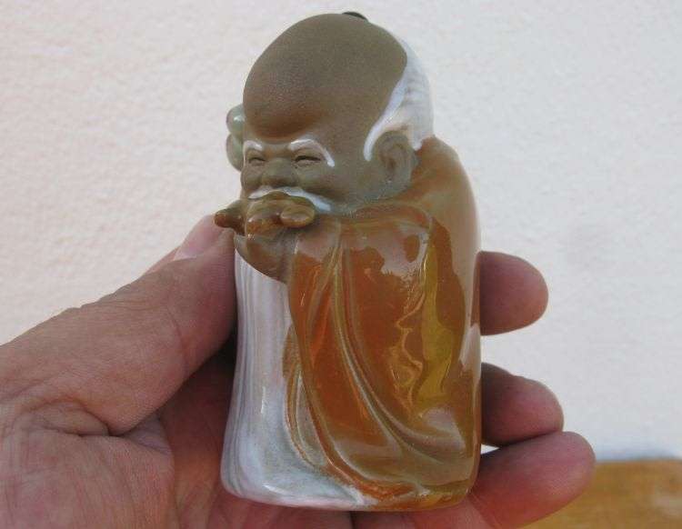 A LOVELY VINTAGE NUMBERED CHINESE CLAY IMMORTAL FIGURE WITH WOODEN STAND ...TOO CUTE !!