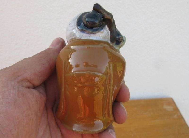 A LOVELY VINTAGE NUMBERED CHINESE CLAY IMMORTAL FIGURE WITH WOODEN STAND ...TOO CUTE !!