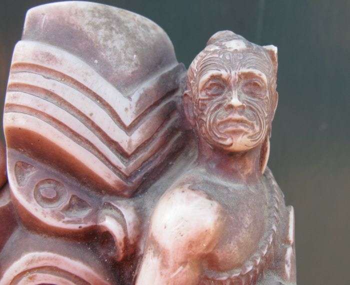 A MOST UNUSUAL AND HEAVY FOR SIZE "TRIBAL" FIGURE ...LOOKS LIKE A MAORI WARRIOR