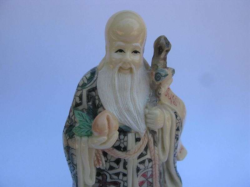 A SUPERB SIGNED VINTAGE ORIENTAL FIGURE OF AN IMMORTAL ...NOT SURE OF COMPOSITION ...VERY COOL !!