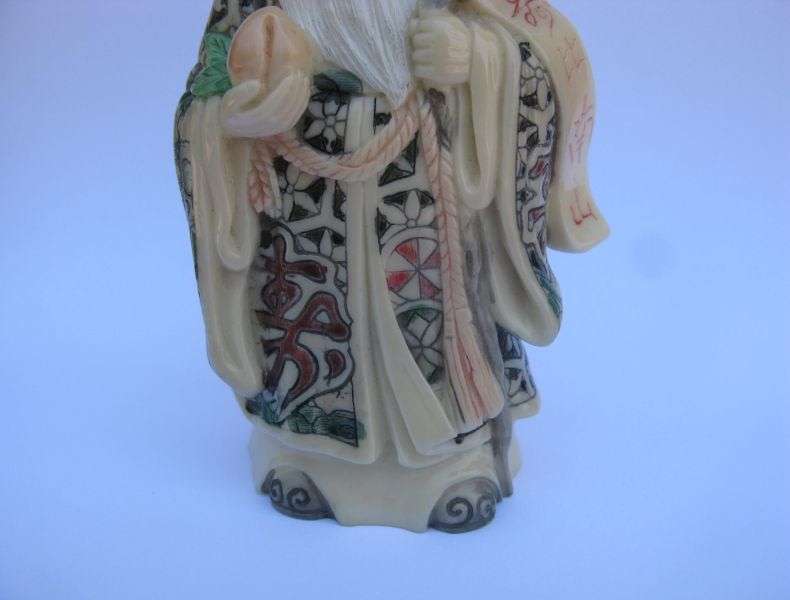 A SUPERB SIGNED VINTAGE ORIENTAL FIGURE OF AN IMMORTAL ...NOT SURE OF COMPOSITION ...VERY COOL !!